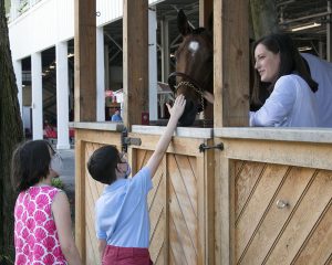 Milfer Farm-bred Uncle Sigh, multiple graded stakes placed, Kentucky Derby participant, and ReRun ambassador, meets fans at the 2021 event. Susie Raisher photo.